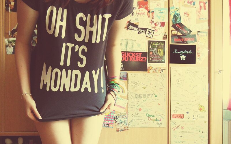 person in t-shirt with text
