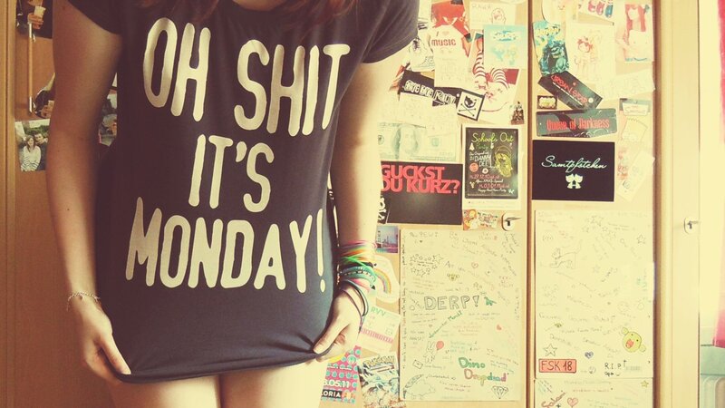 person in t-shirt with text