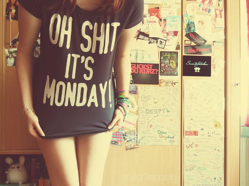 person in t-shirt with text