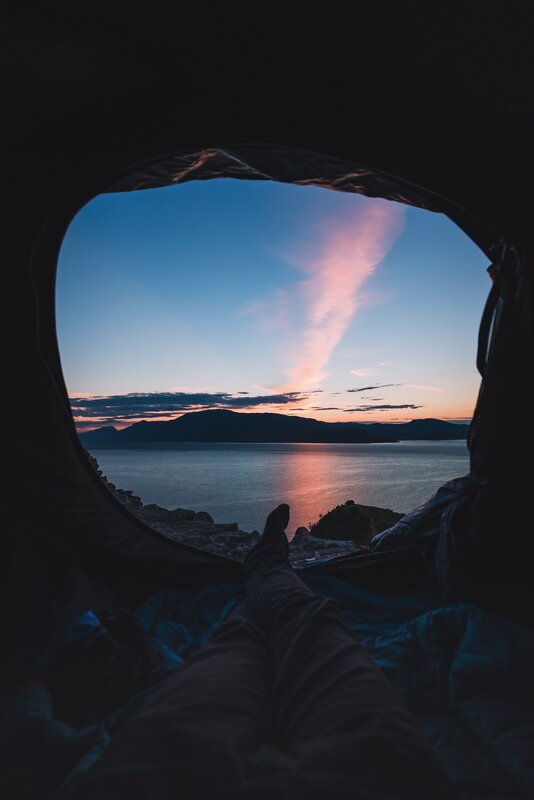 Person in Tent at Sunset