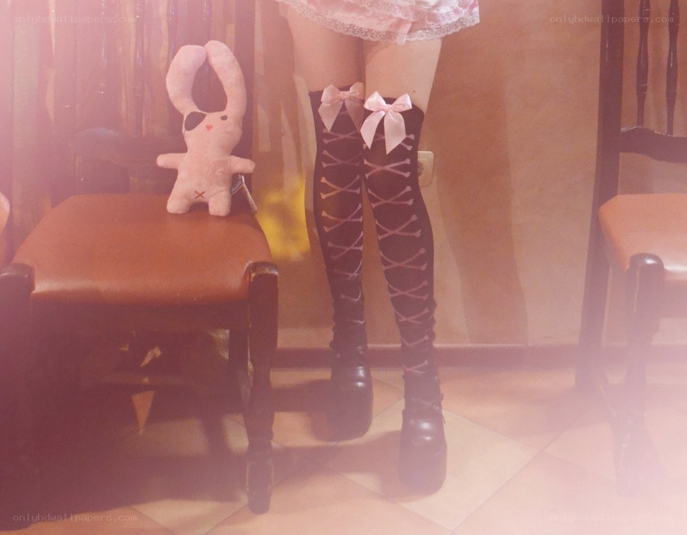 person in thigh-high boots