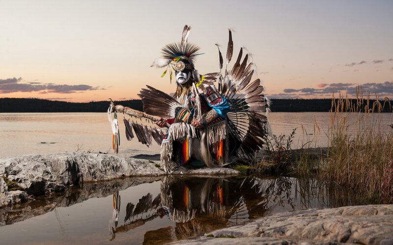 Person in Traditional Regalia — Brown
