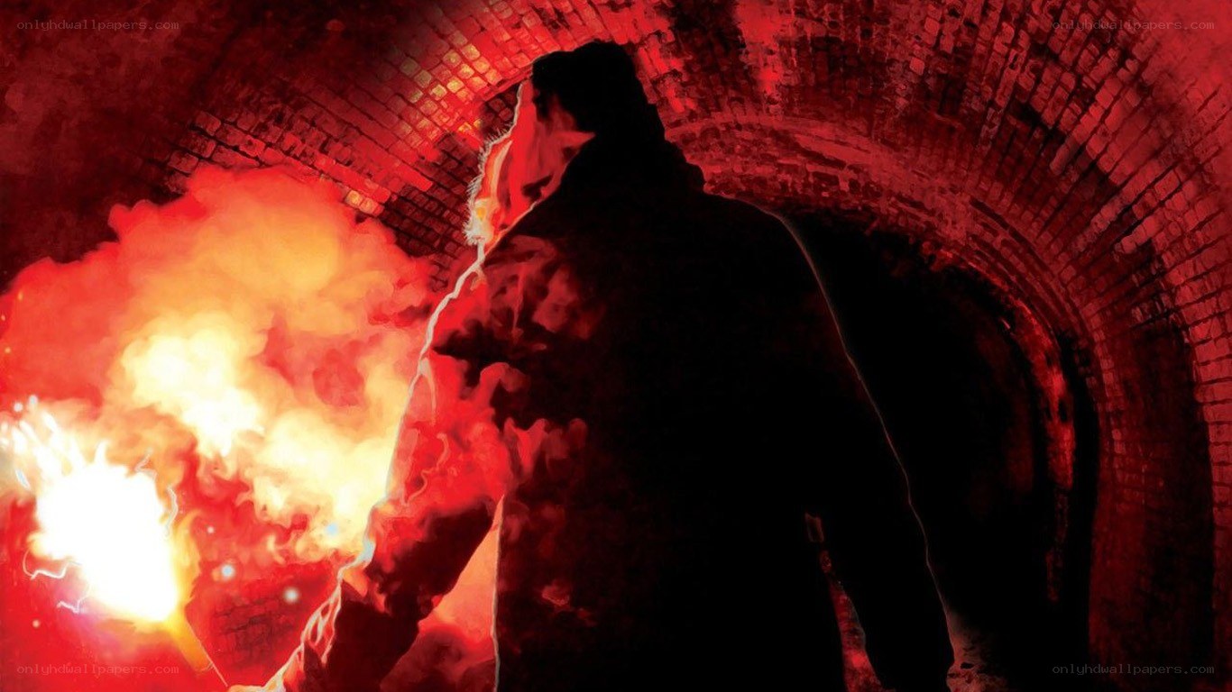 person in tunnel with flare