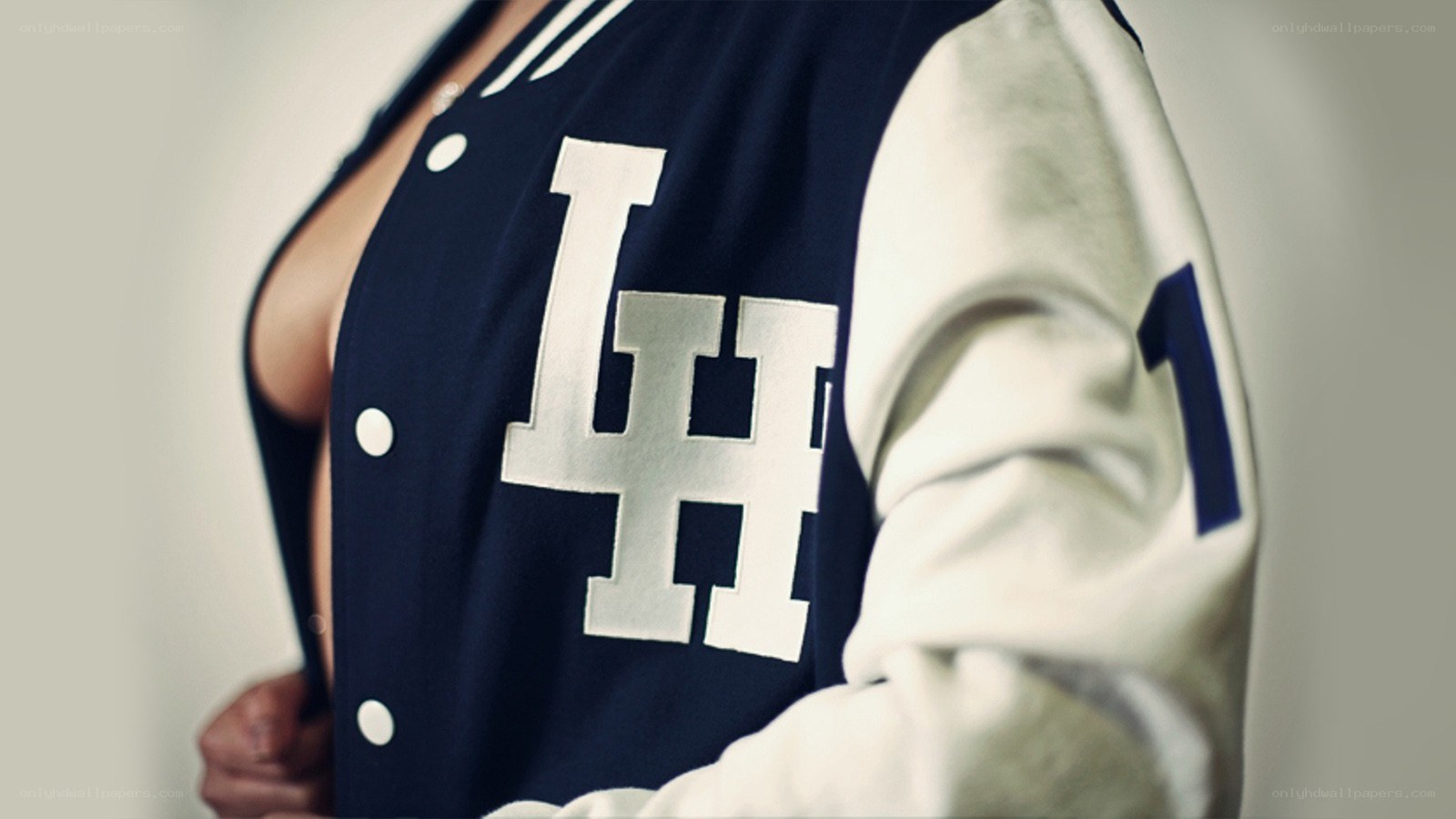 person in varsity jacket