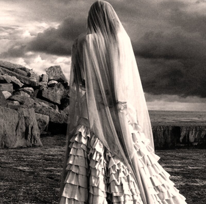 Person in Veil and Ruffled Dress