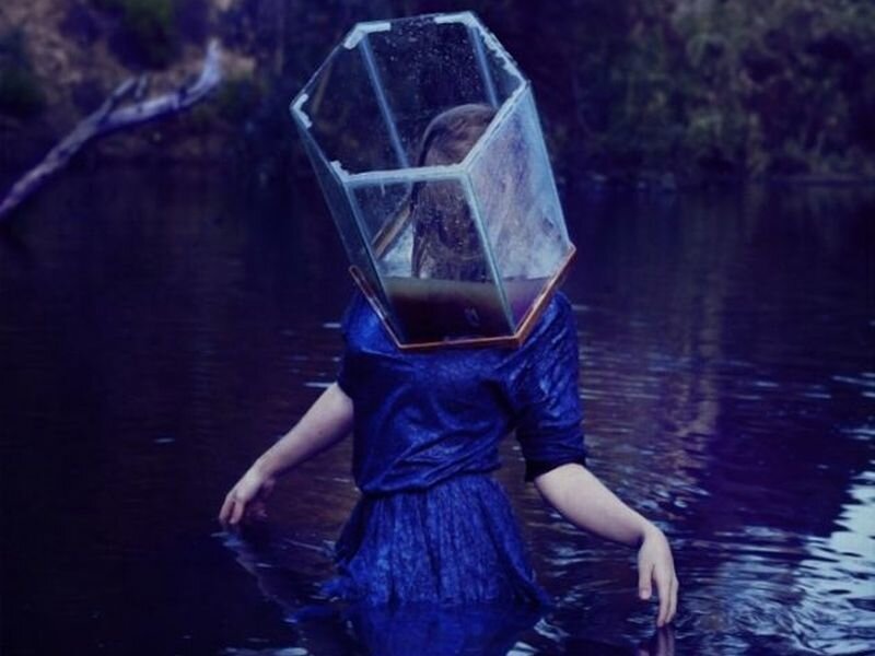 Person in Water with Head Container