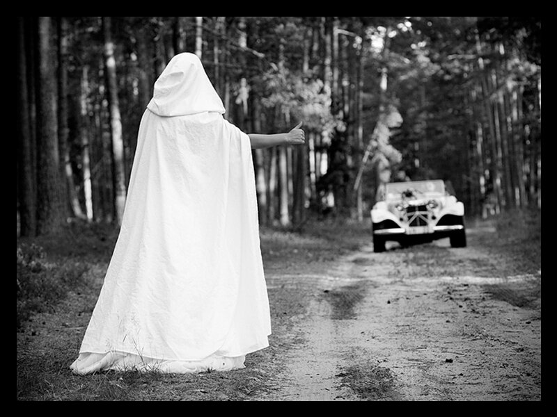 Person in White Cloak