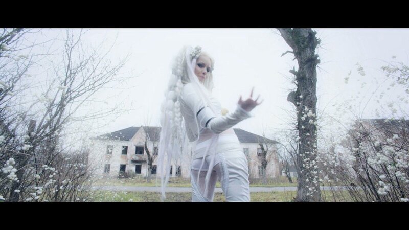 person in white costume outdoors