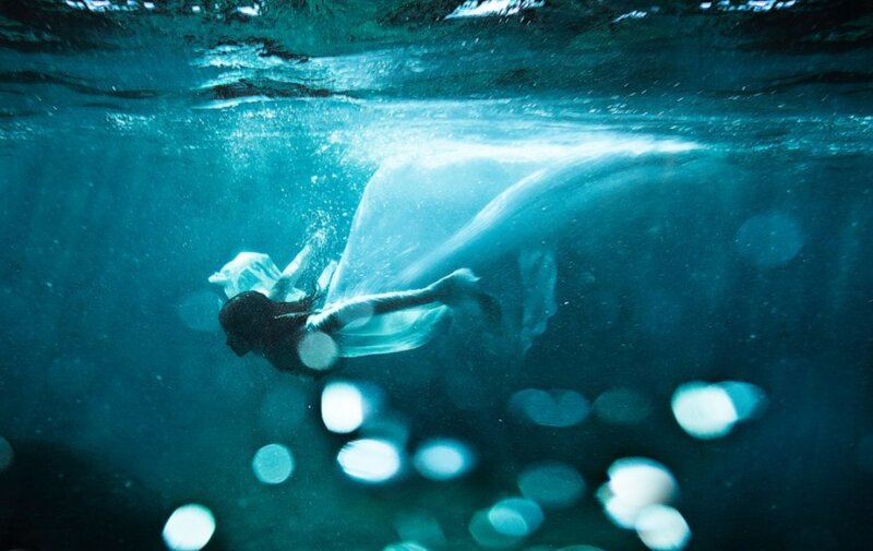 Person in White Dress Underwater — Blue