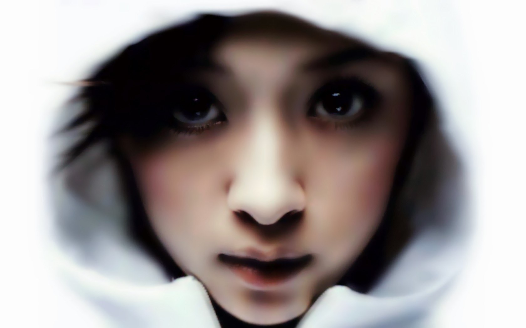 person in white hood close-up