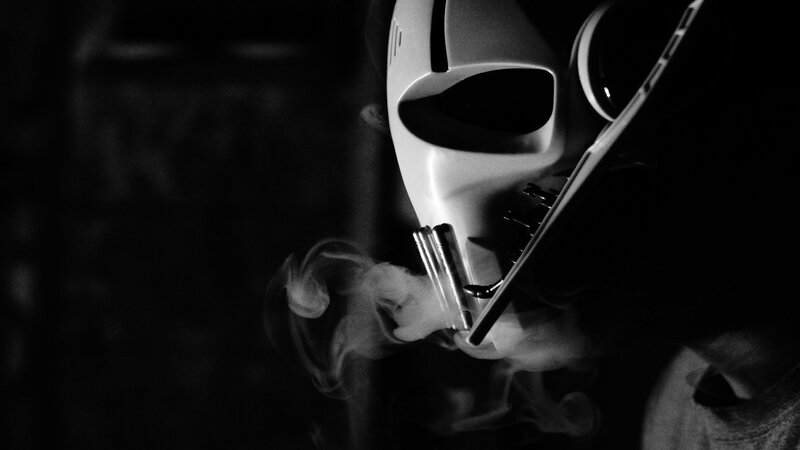 Person in White Mask — Black, Dramatic