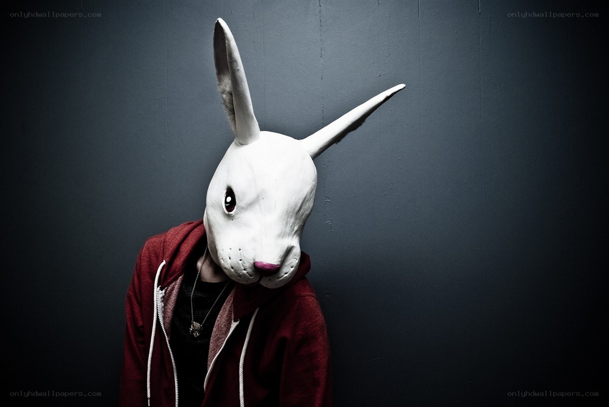 person in white rabbit mask