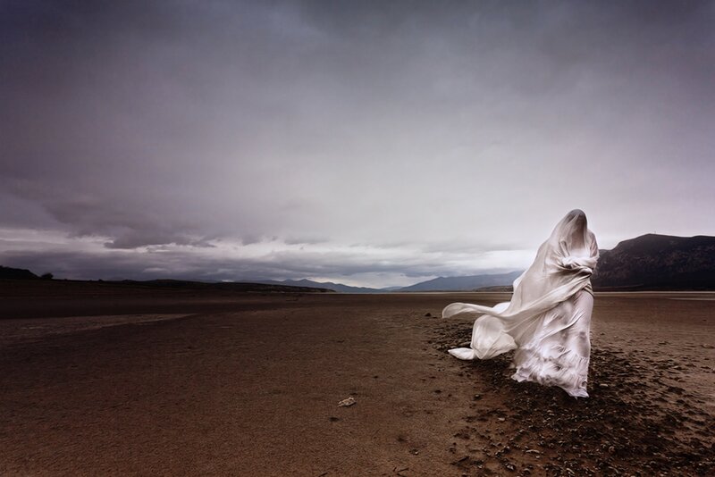 Person in White Robe — Gray, Dramatic