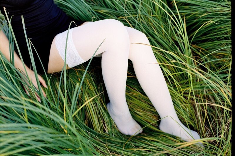 person in white stockings