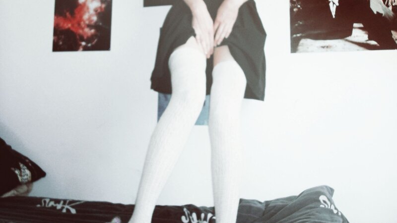 person in white stockings