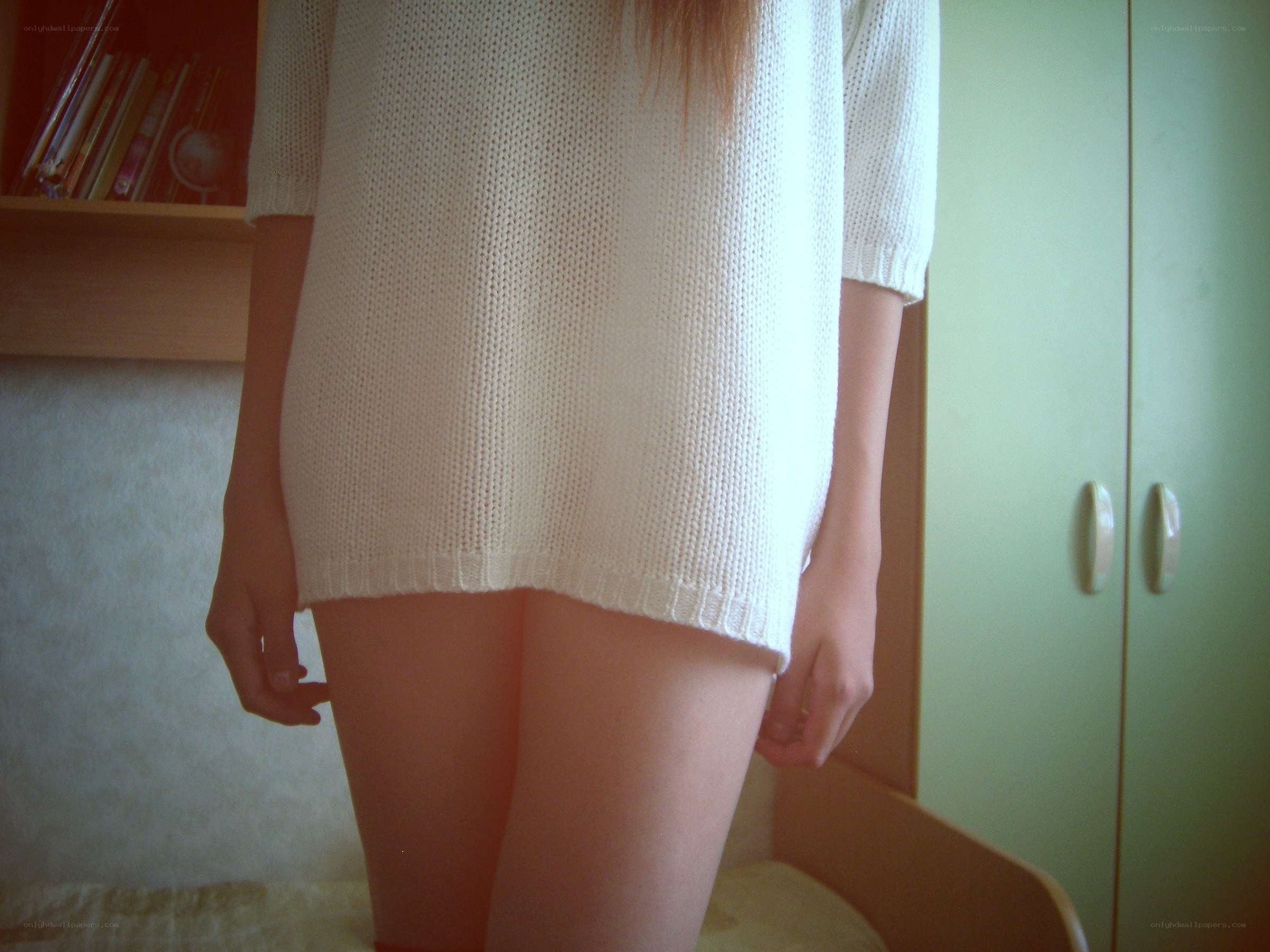 person in white sweater