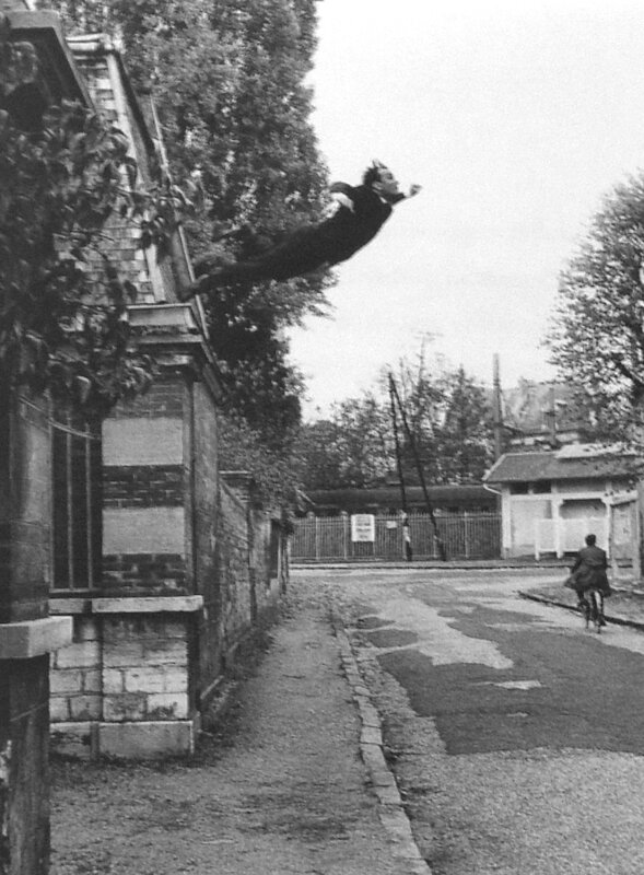 person jumping from building