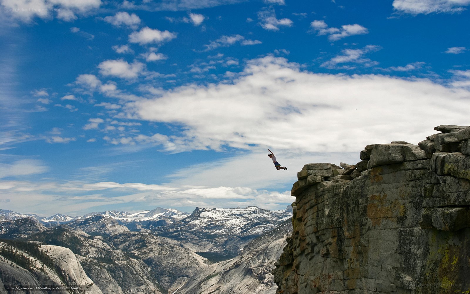 Person jumping from cliff