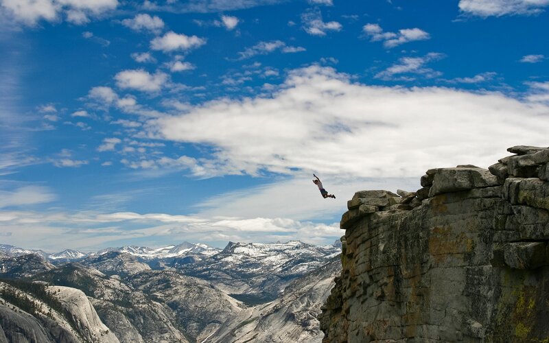 Person jumping from cliff
