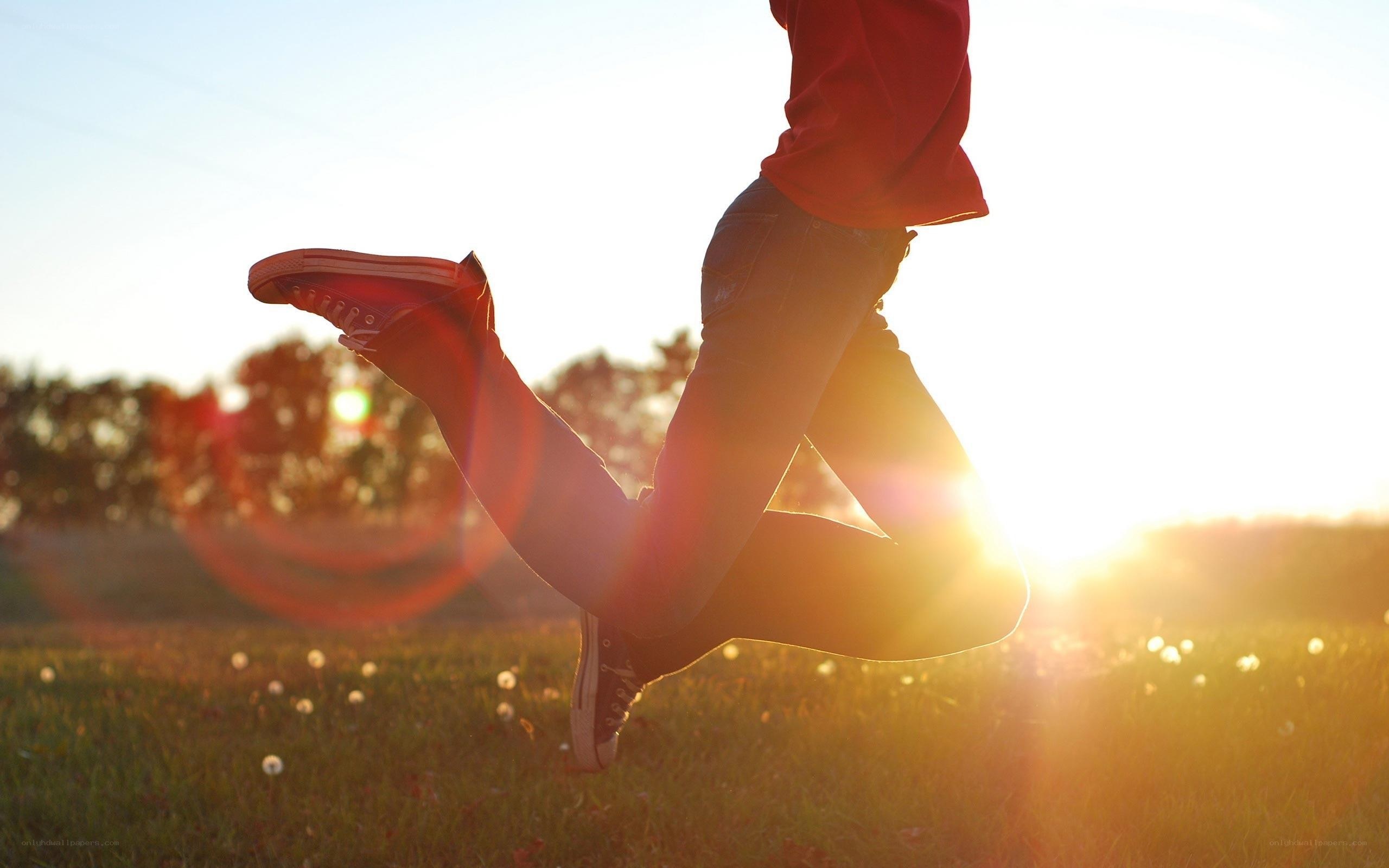 Person jumping in a field