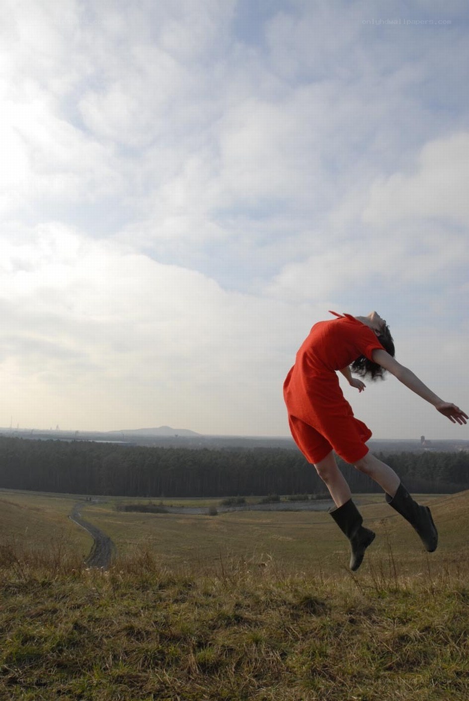 Person jumping in a field