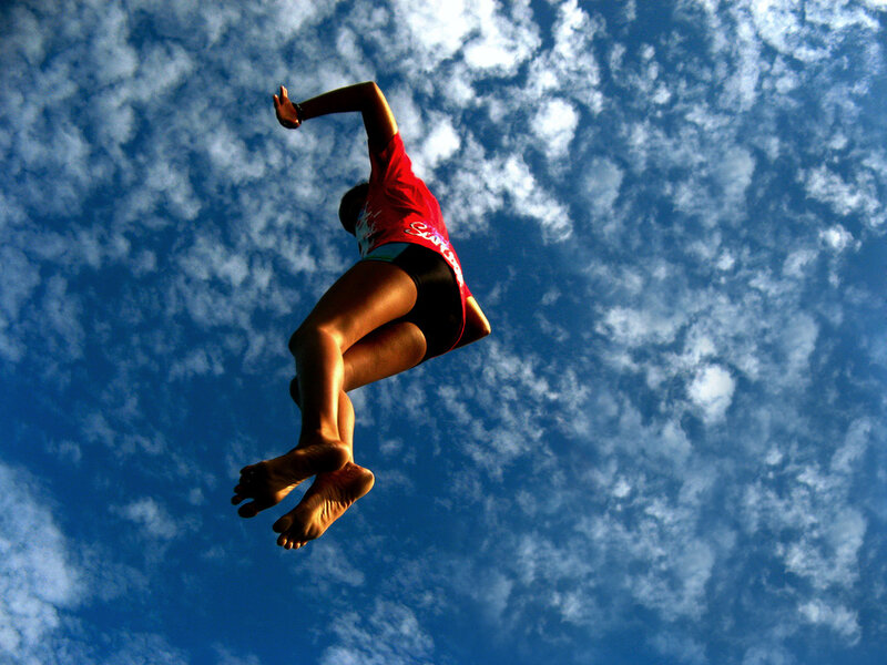 Person Jumping in Air — Blue