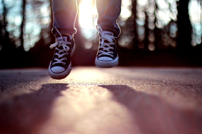 Person Jumping in Sneakers