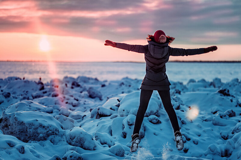 Person Jumping in Snow