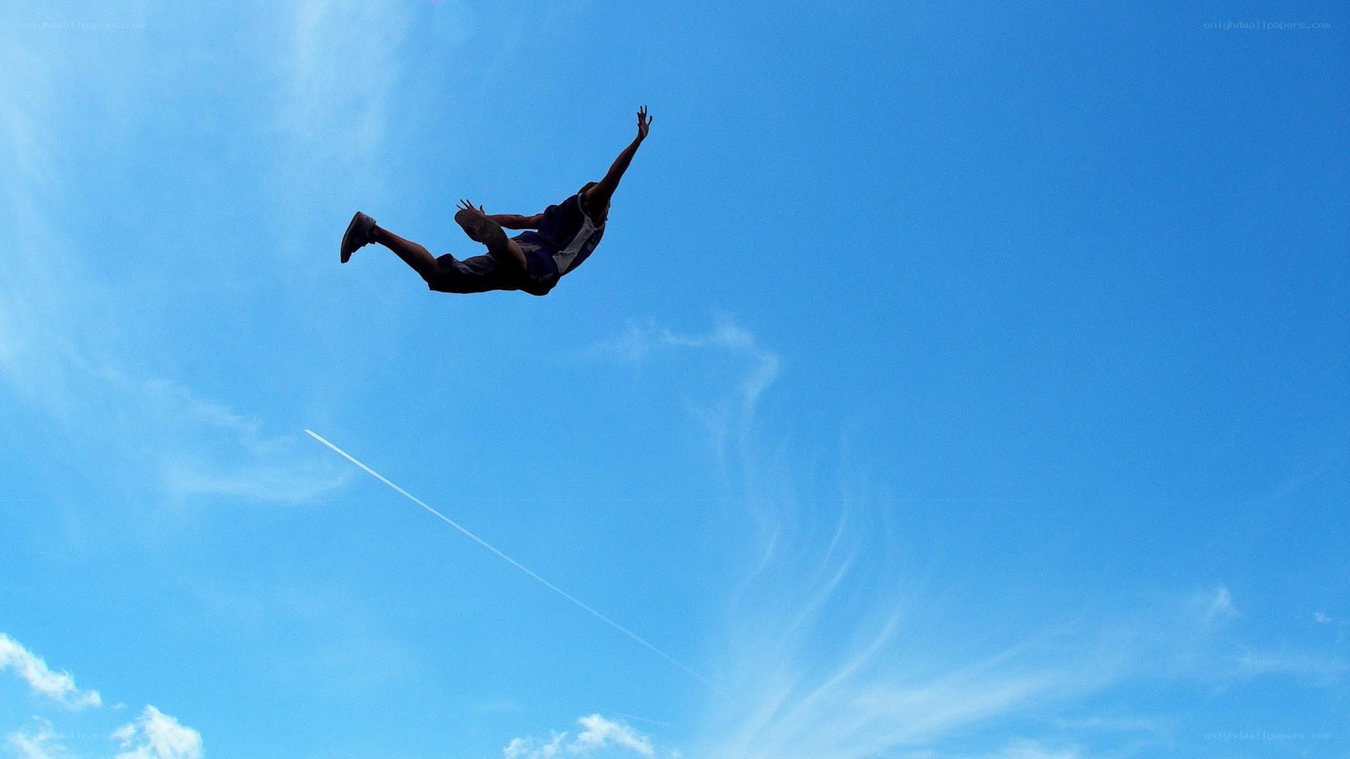 person jumping in the sky