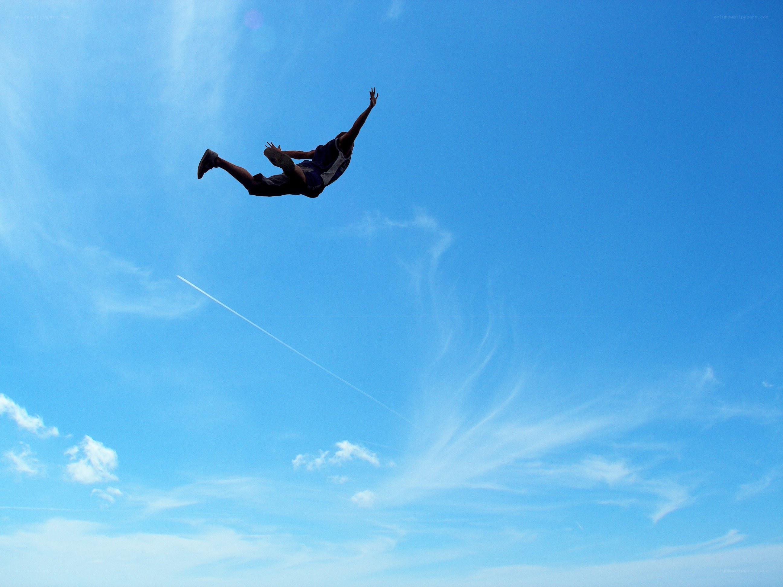 Person jumping in the sky