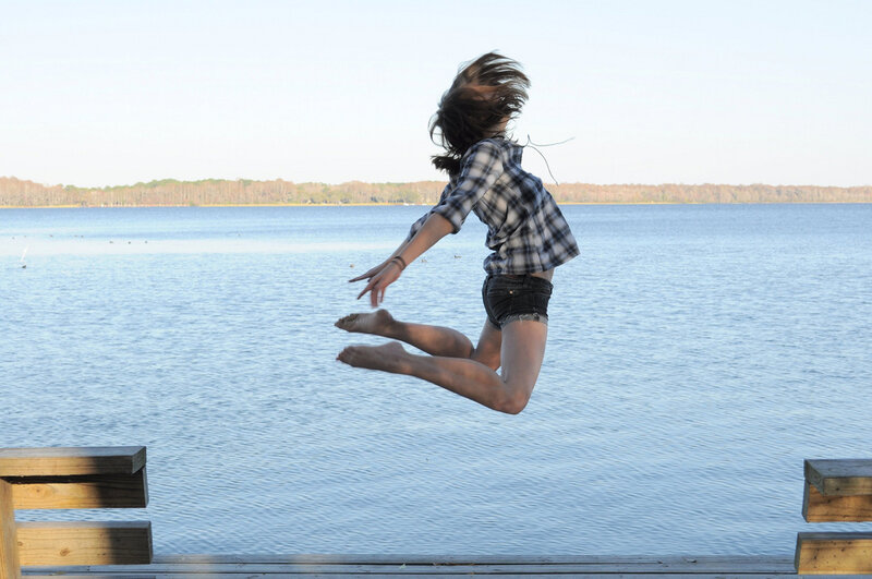 Person Jumping into Water — Blue
