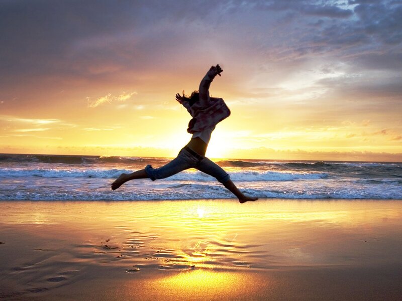 Person Jumping on Beach — Yellow, Dramatic