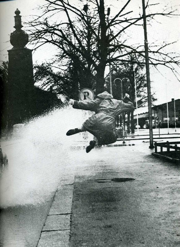 Person jumping over water splash
