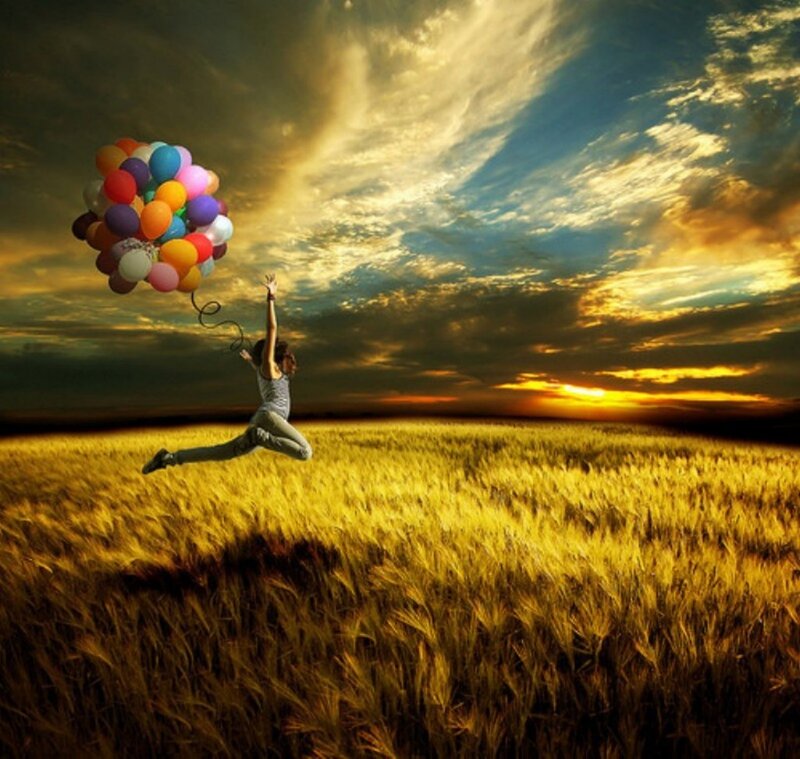 Person Jumping with Balloons