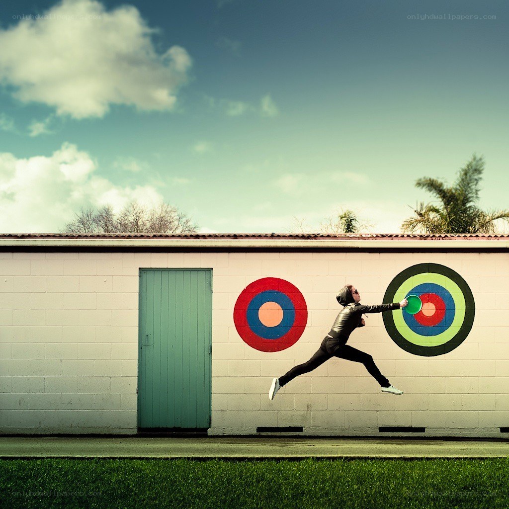 Person jumping with frisbee