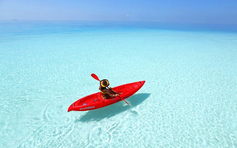 Person Kayaking in Ocean — Blue, Serene