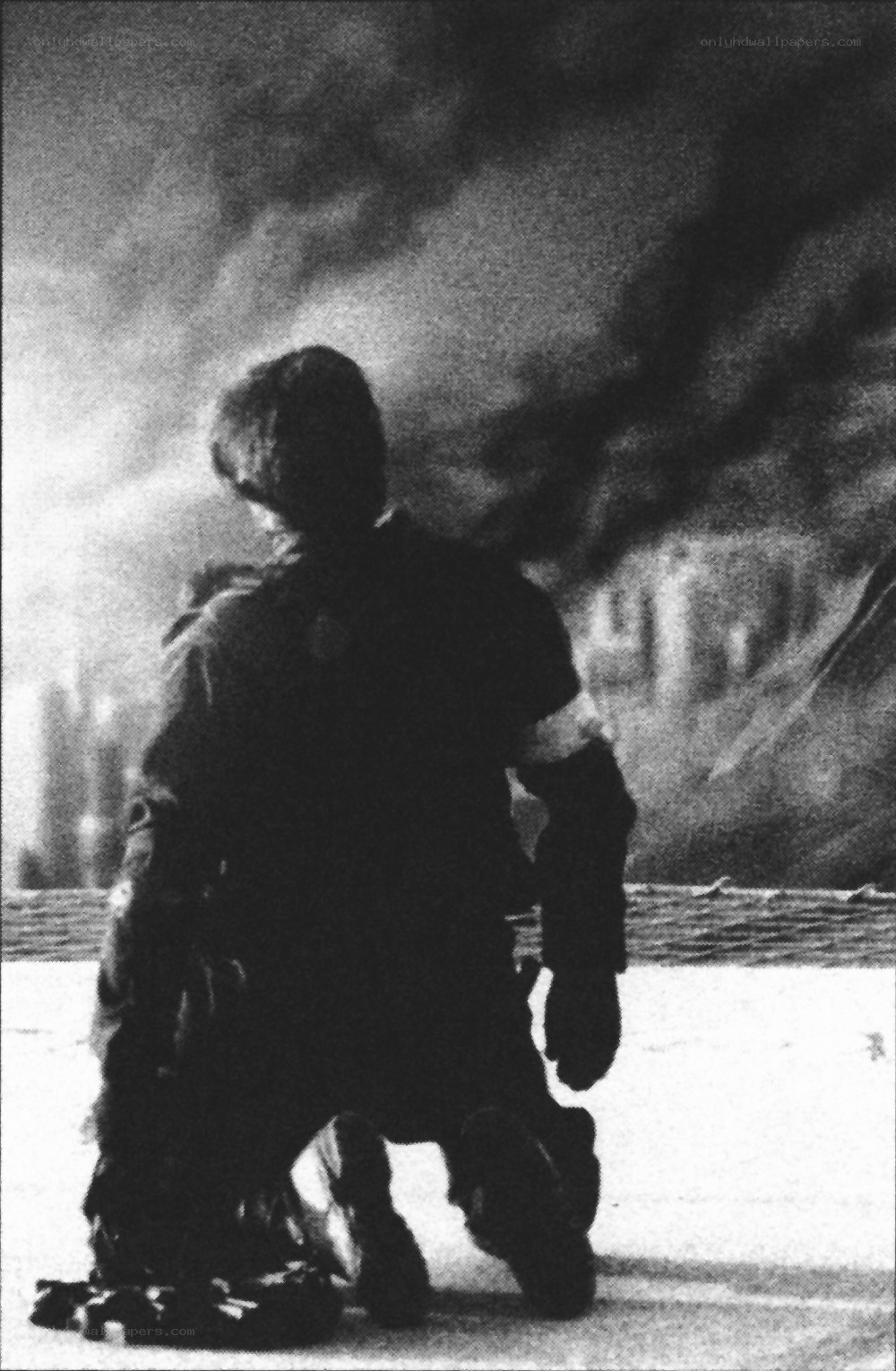 person kneeling in smoke