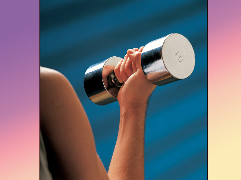 person lifting dumbbell