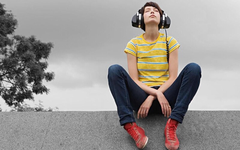 person listening to music