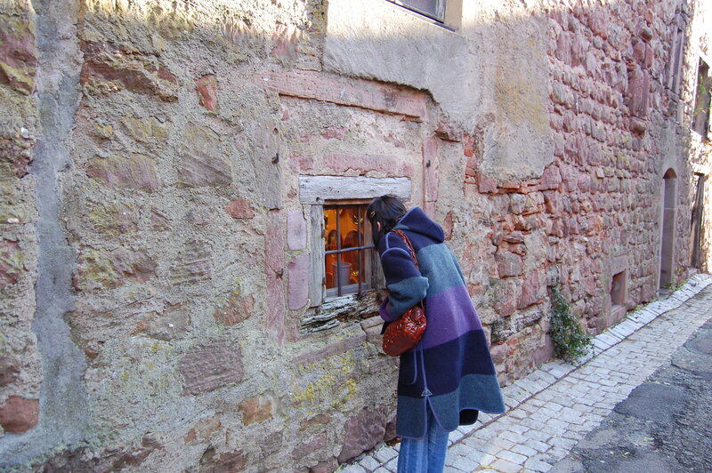 Person Looking into Window