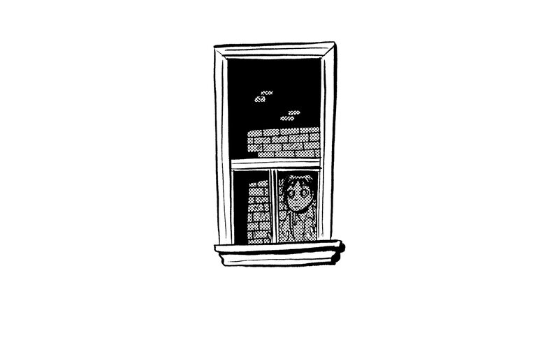 person looking out window