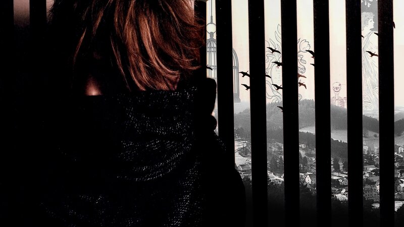 Person Looking Through Bars