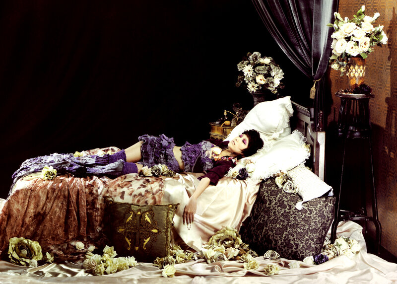 Person Lying on Bed — Purple, Dramatic