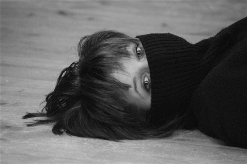Person Lying on Floor — Black