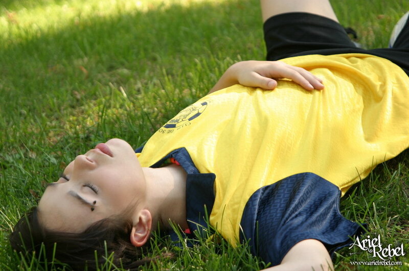 person lying on grass