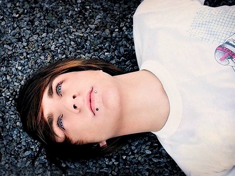 Person Lying on Gravel