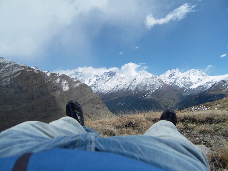 Person Lying on Mountain