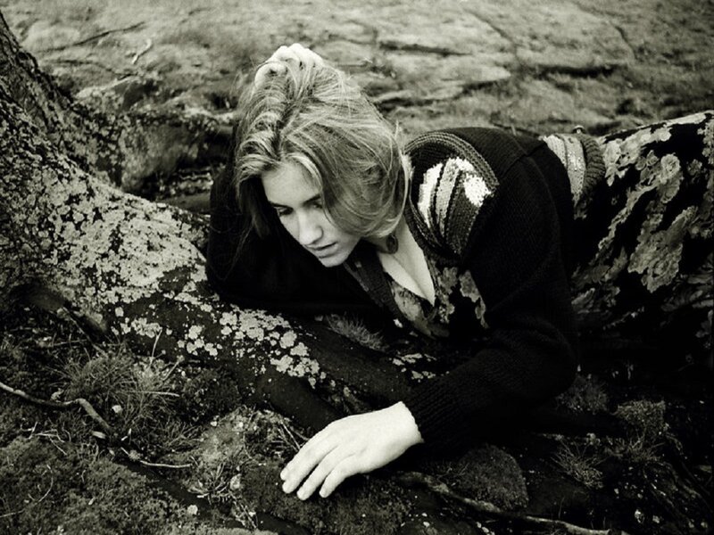 Person Lying on Tree Root