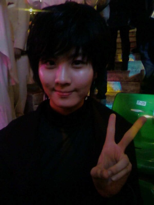 person making peace sign