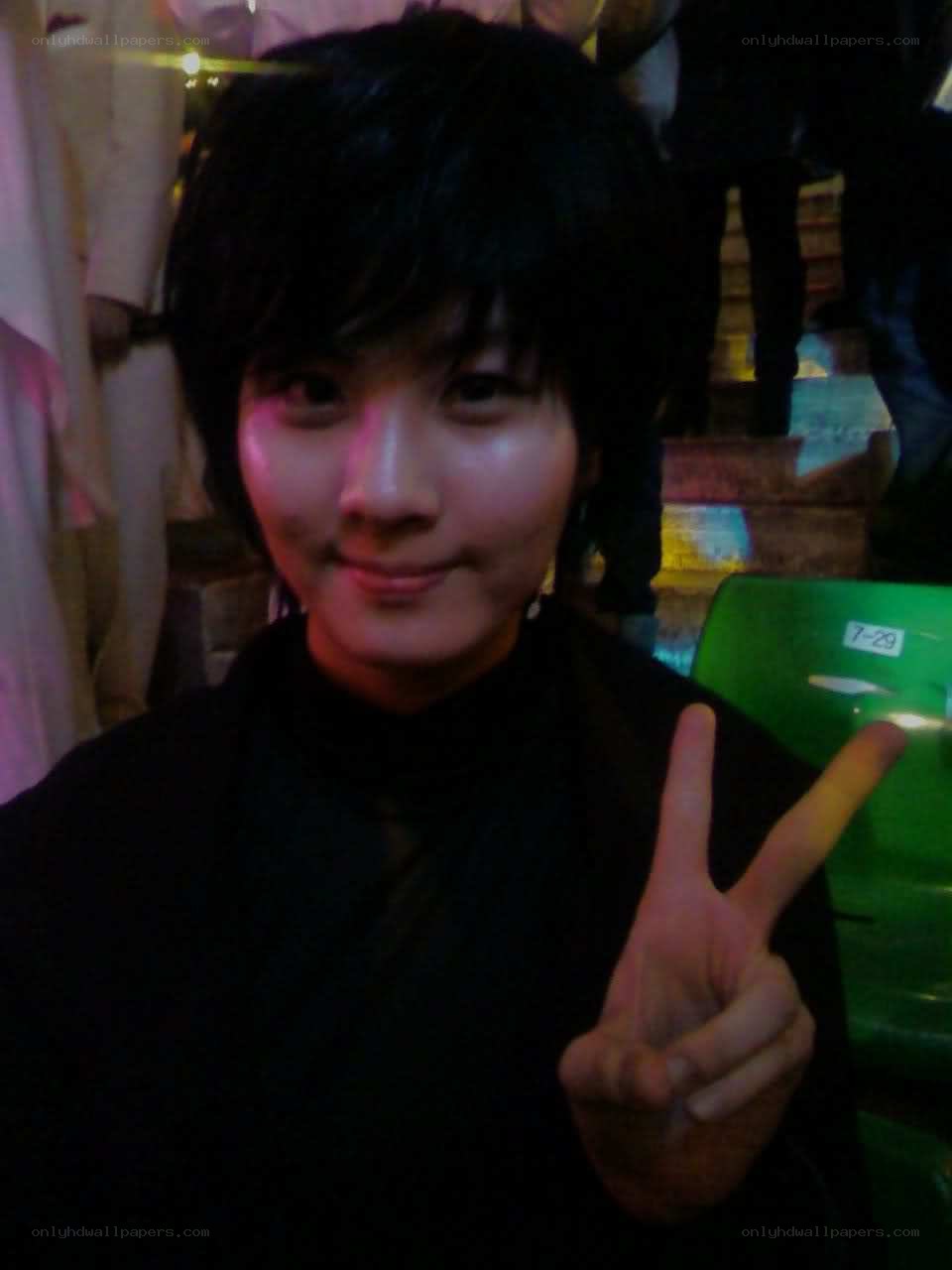 person making peace sign